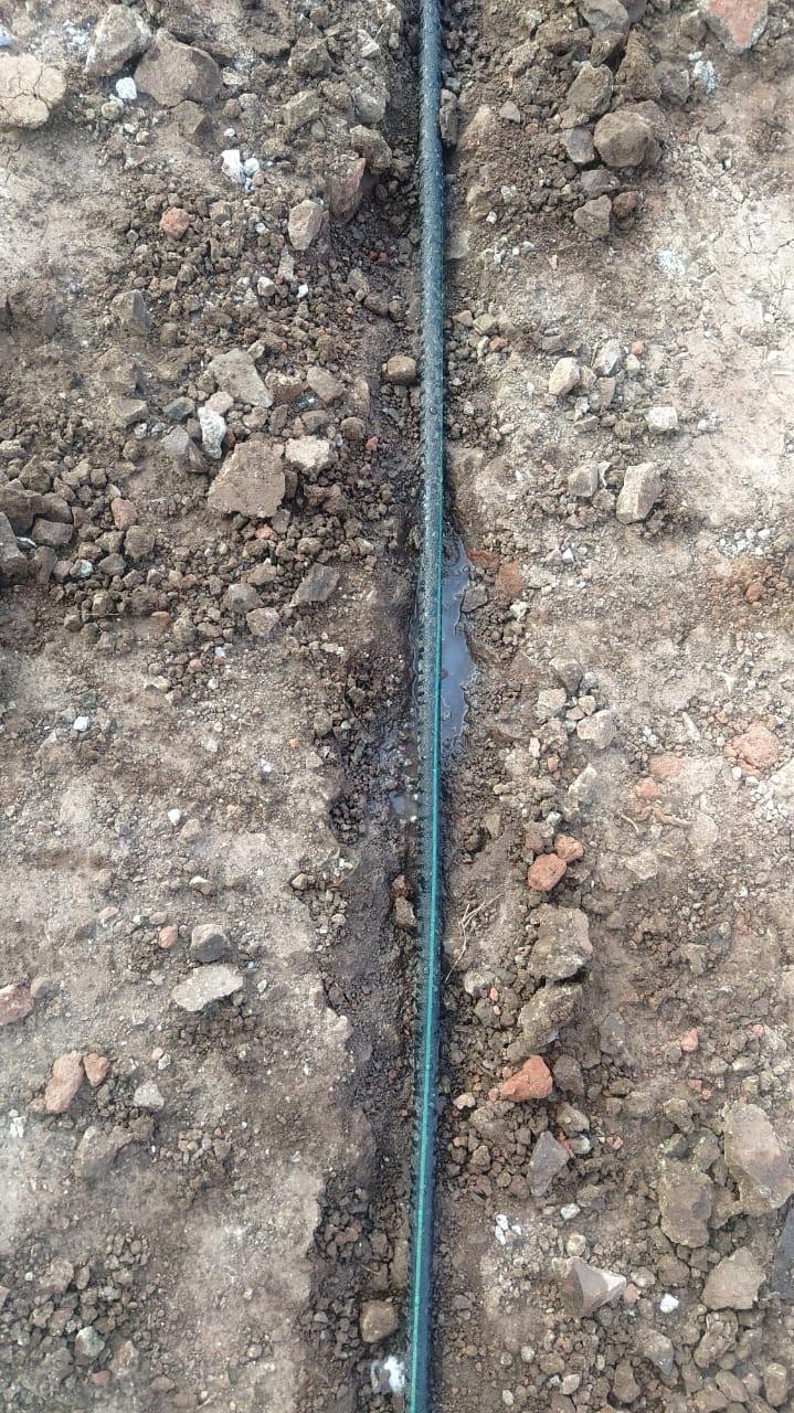 Termiticide release through pipe reticulation system