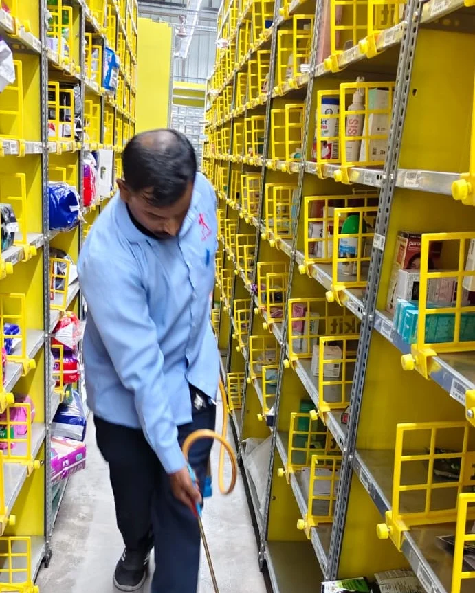 On-site rodent monitoring in a commercial warehouse aisle — Pied Pipper, Maharashtra